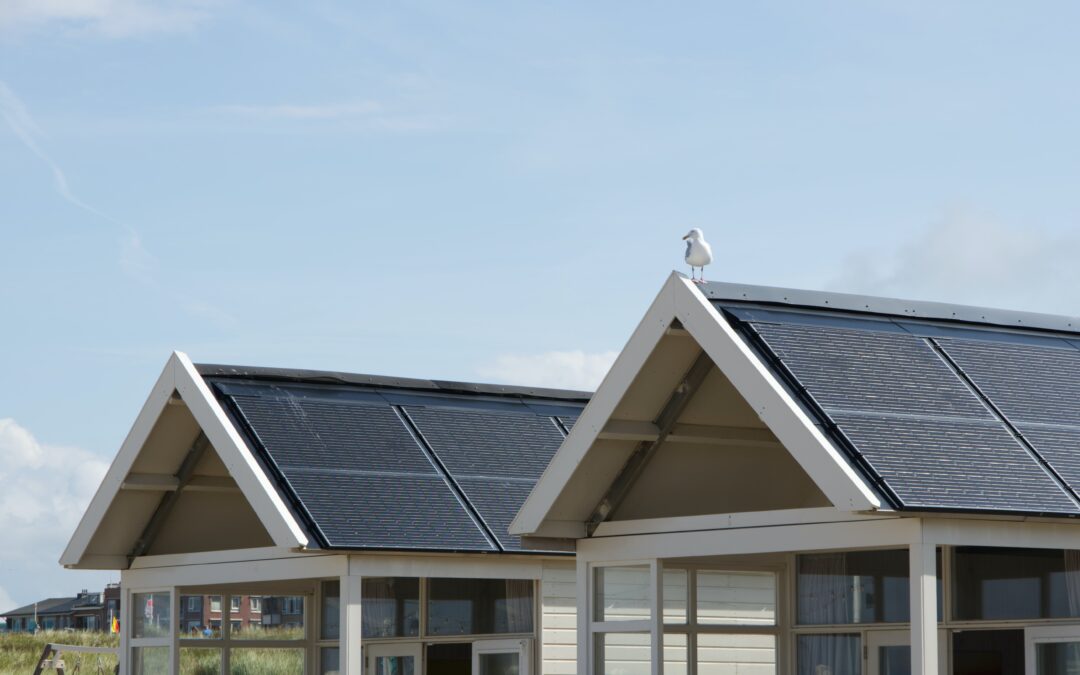 Solar panels on a roof, one of many green upgrades that increase your home value.
